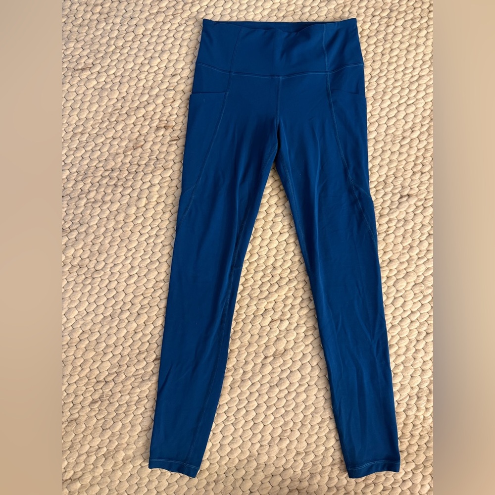 Athleta Stash Pocket Salutation Leggings - Blue
